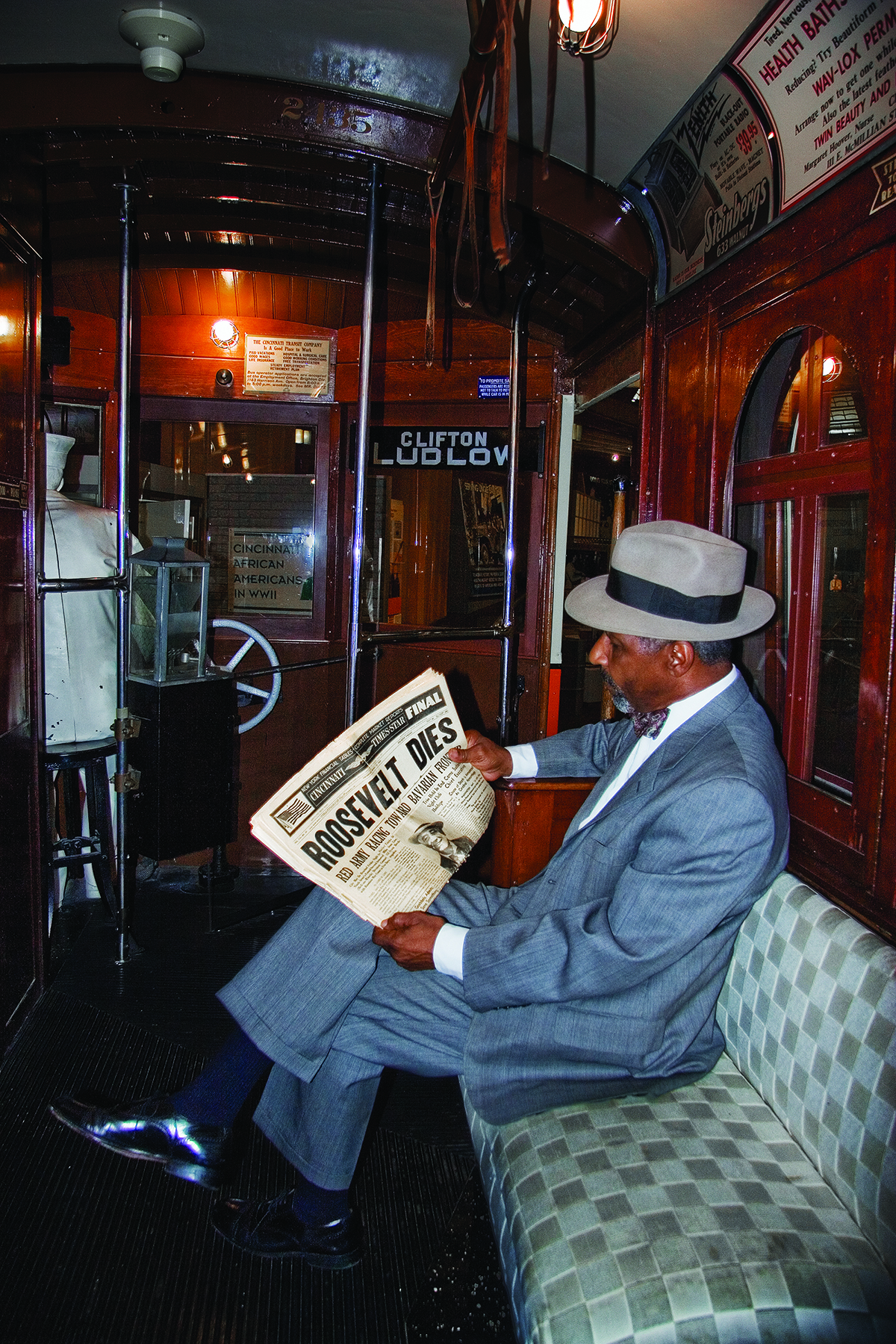 image of man reading a newspaper
