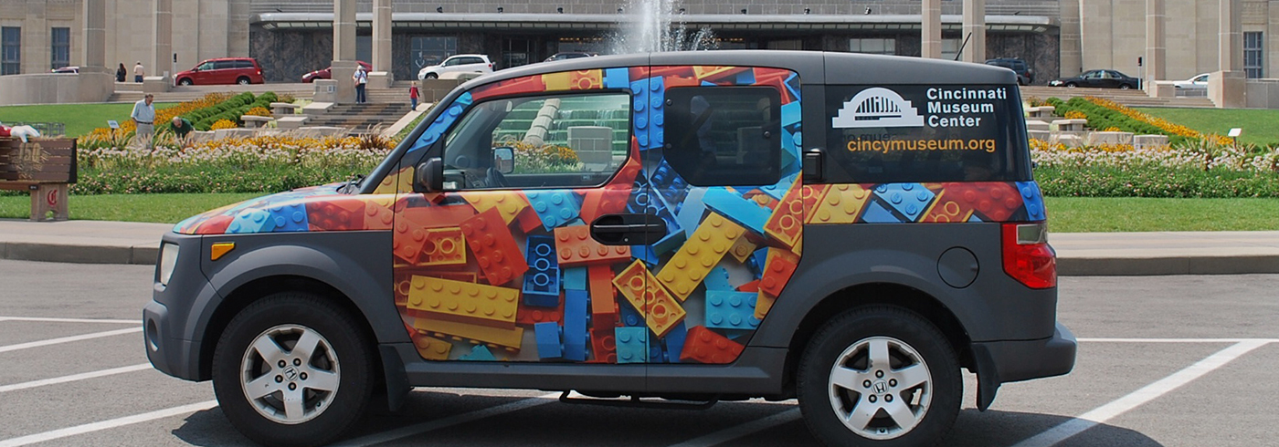 photo of the CMC wrapped vehicle in front of the fountain at Union Terminal